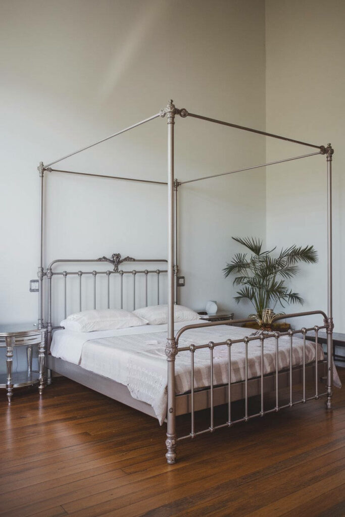 16. Minimalist Silver Bedroom with Soft Lighting